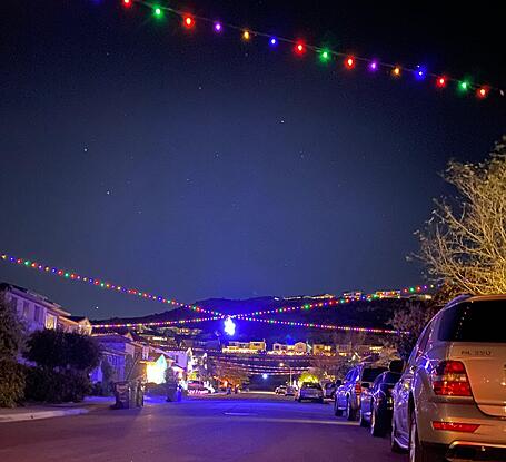 Christmas Lights Installation with Star over street